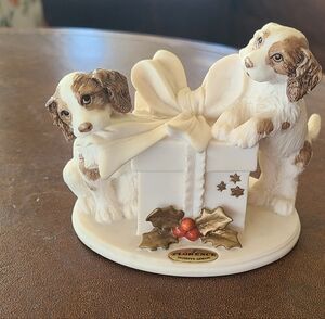 Giuseppe Armani "mischief " signed piece. Puppies with a Christmas package
